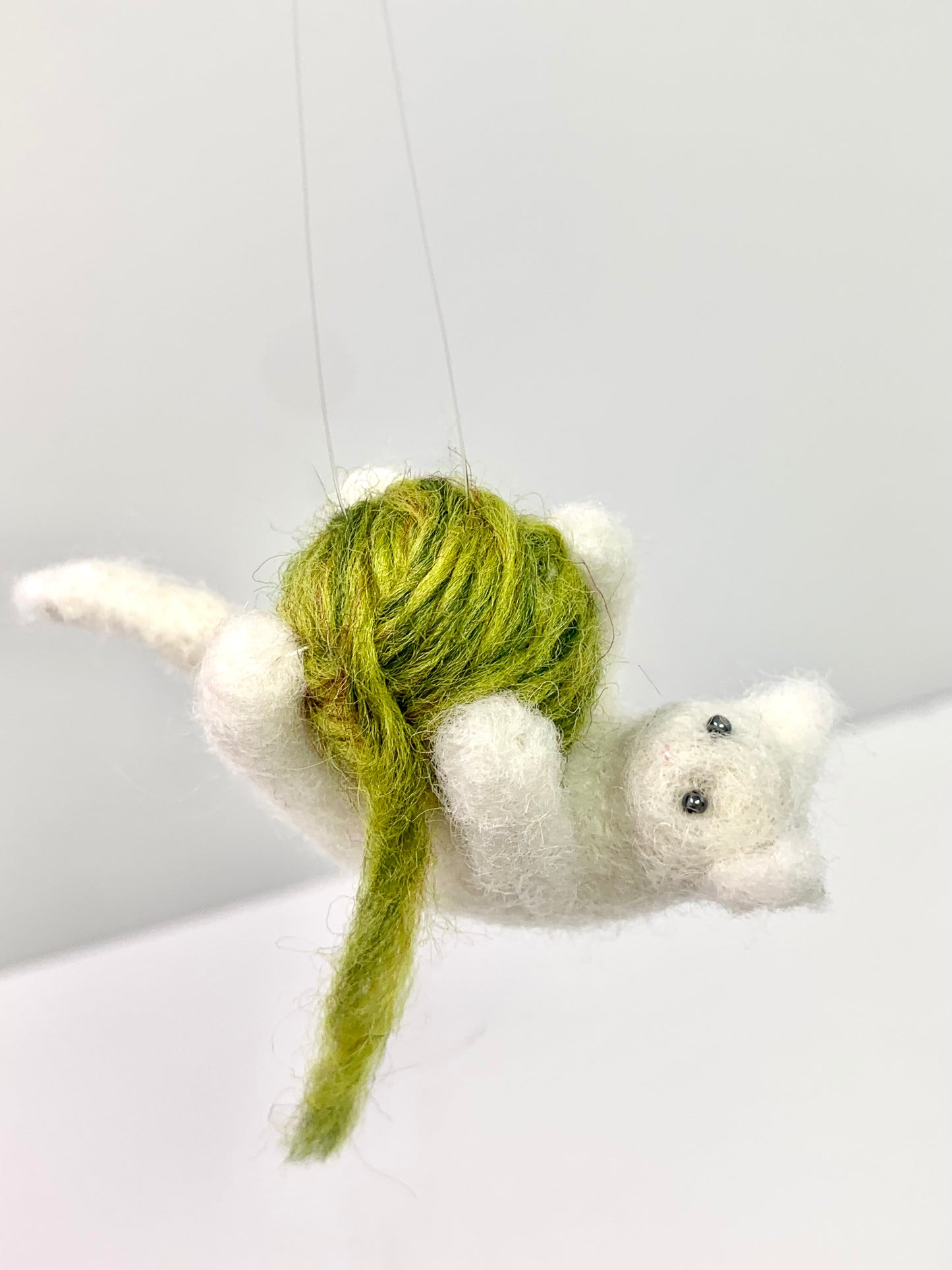 Cat Holding Yarn Ball Ornament