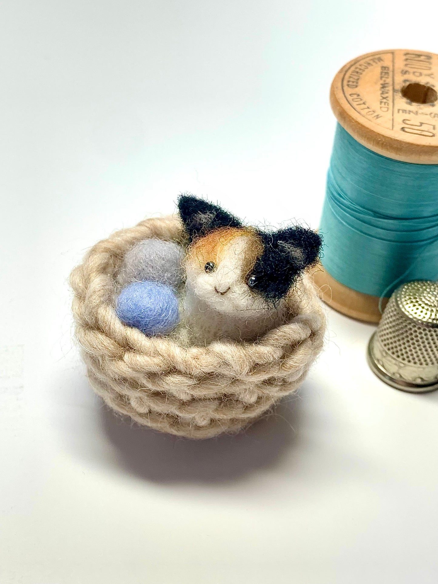 Calico Cat in Basket of Yarn Ornament
